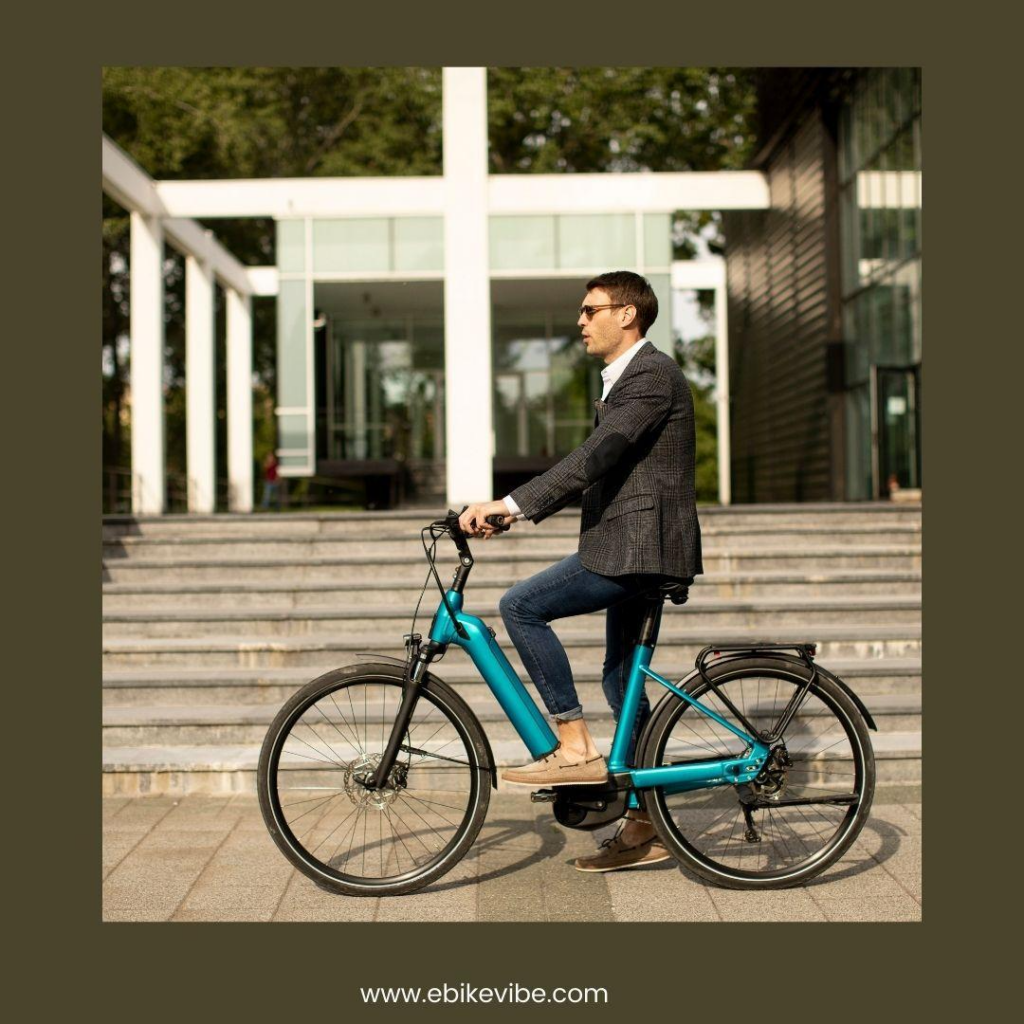 A man is riding his Sky blue Ebike