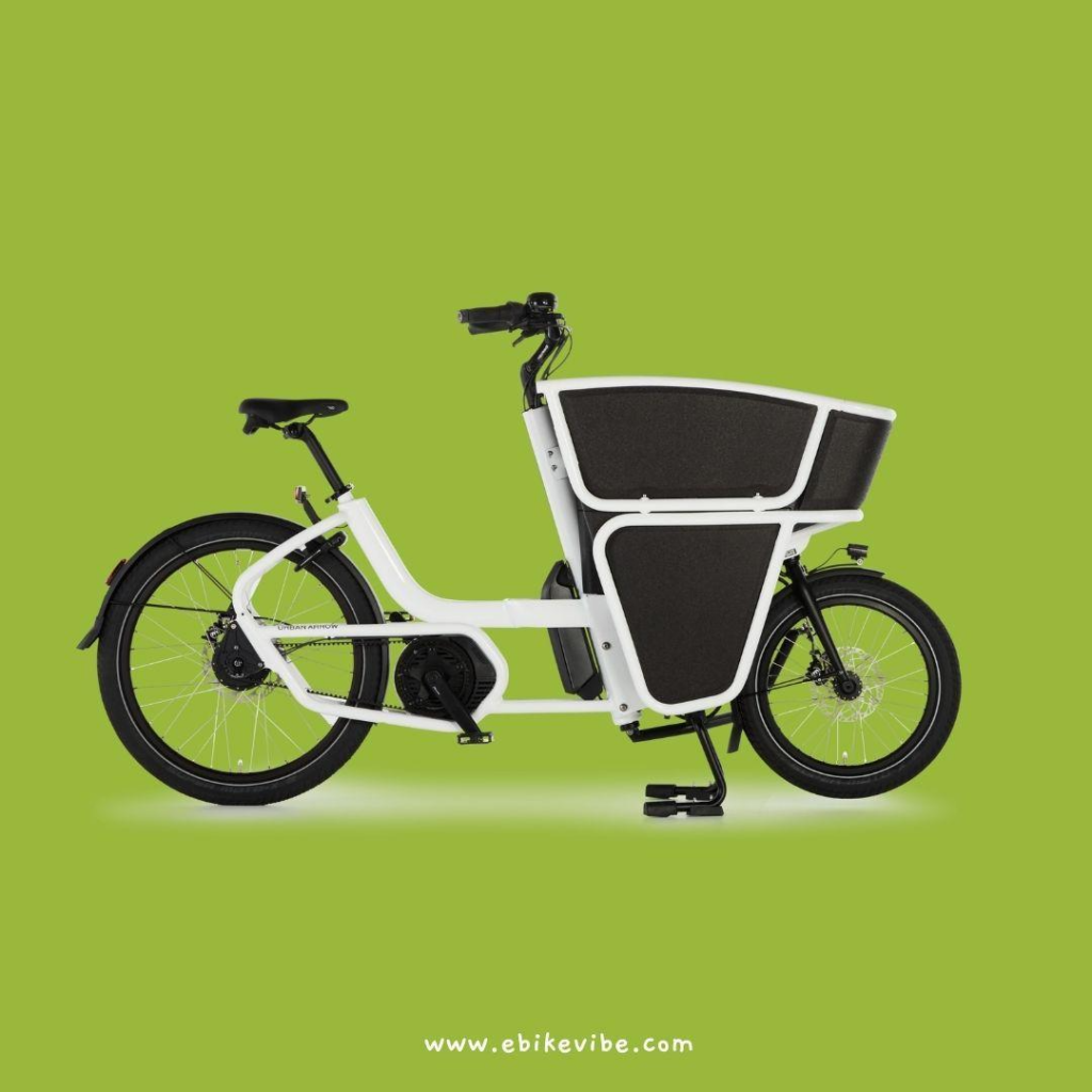 Urban Arrow white cargo electric bike with a black cargo in front of bike