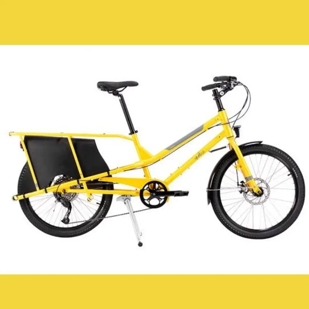 A yellow electric bike with a basket on the back.