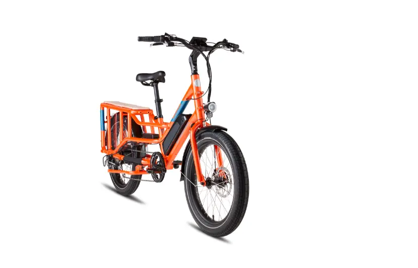 An orange electric Cargo bike is shown against a white background.