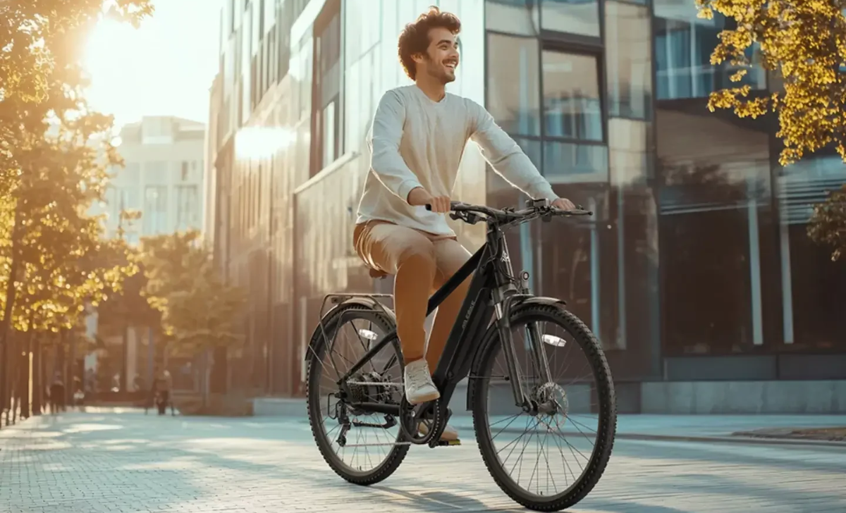 Young man riding a lightweight electric bike in a modern city during golden hour, representing “What is the Lightest Ebike?” concept for urban commuting.